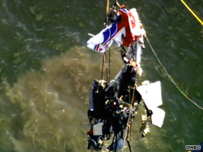 The wreckage of a plane that collided with a helicopter is lifted last week from the Hudson River.