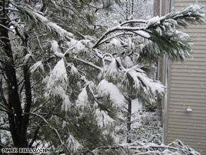 Snow coats South; New England braces for storm