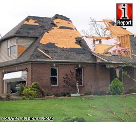 Deadly storms drive tornado by man's home