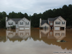 Floodwater surrounds homes near Atlanta on Tuesday.