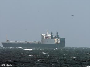 A parachute, believed to be carrying part of the ransom, drops near the Faina.