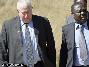 Roy Bennett, left, pictured with MDC leader Morgan Tzvangirai, is also the party's treasurer.