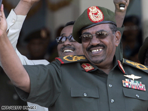 Sudanese President Omar Hassan al-Bashir waves to troops at a rally in Khartoum, Sudan, on Tuesday.