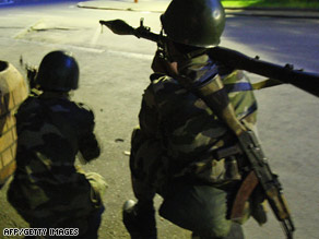 Soldiers are shown taking positions on the streets of Madagascar's capital, Antananarivo, on Monday night.