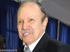 Algerian President Abdelaziz Bouteflika arrives to cast his vote at a school in Algiers.