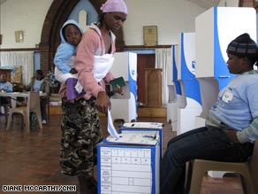 Former South African president Thabo Mbeki casts his vote Wednesday.