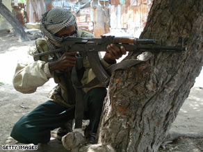 An Islamist fighter mans a position in the streets of Mogadishu, Somalia, on Saturday.