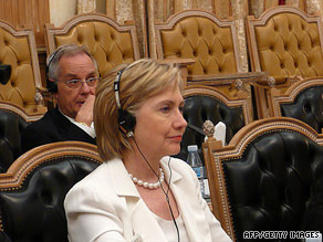 Hillary Clinton listens to Angolan Foreign Minister Assuncao dos Anjos, not pictured, on Sunday.