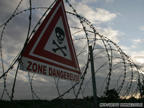 Signs such as this were still up in "toxic zones" around Abidjan, Ivory Coast, a year after the waste dumping.