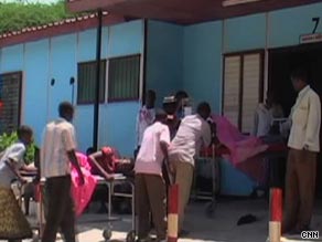 Casualties are taken into Mogadishu's hospital on stretchers.