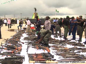 Hundreds of militants have laid down their weapons in exchange for a pardon and a job.