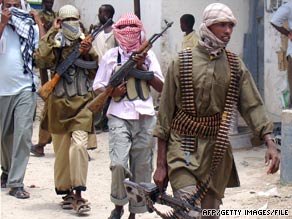 Members of Islamist militia Al-Shaabab patrol Bakara Market in Mogadishu, Somalia, earlier this month.
