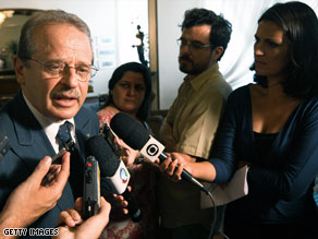 Brazil's Minister of Justice Tarso Genro talks with reporters on Wednesday.