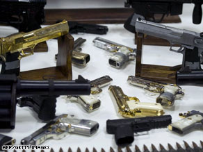Cartridges and weapons seized from gangsters and drug-traffickers at the Military Headquarter in Mexico City.