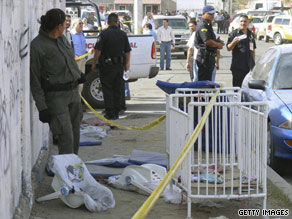 People arrive at the scene of a deadly fire at a day care in Mexico.