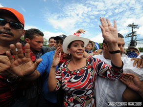 Honduran first lady Xiomara Castro de Zelaya joins a protest march Tuesday in Tegucigalpa.