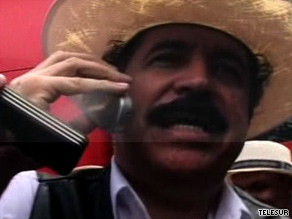 Ousted Honduran President Jose Manuel Zelaya waits at the border Friday afternoon.