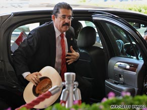 Supporters of Zelaya marched in the streets of Honduras capital city, Tegucigalpa, on Wednesday.