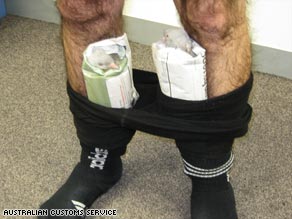 Customs officials in Australia allege that a man tried to smuggle pigeons hidden in his tights.