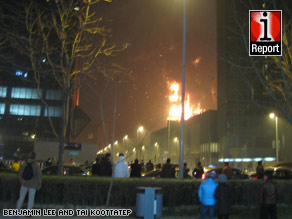 This image sent in by an iReporter shows the blaze spreading through the ultra-modern hotel.
