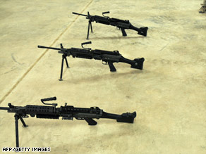 U.S.-issue M249 squad automatic weapons are shown at a camp in Kandahar in December.