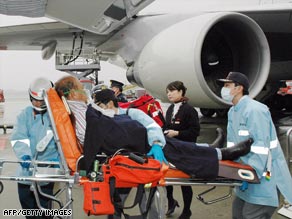 A passenger injured when turbulence struck the NWA flight is taken to hospital.