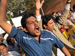 Pakistani journalists shout slogans during a protest in Karachi against the killing of a journalist in Swat Valley.