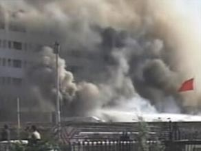 Smoke pours from the Marriott Hotel in Islamabad.