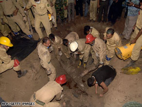 Bangladeshi firefighters continued to uncover bodies Friday of Bangladesh Rifles officers from a mass grave.