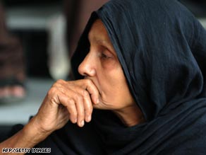 A Bangladeshi woman waits for news of a missing relative at the Bangaldesh Rifles heaquarters in Dhaka.