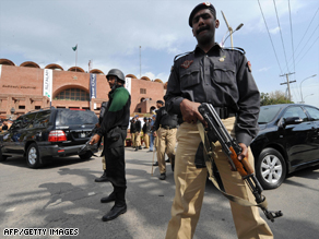 Pakistani policemen outside The National Stadium after masked gunmen attacked the Sri Lankan cricket team in Lahore on March 3, 2009.