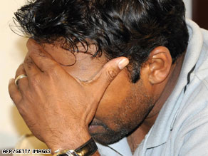 Cricket captain Mahela Jayawardene reacts Wednesday after returning to Sri Lanka's capital, Colombo.