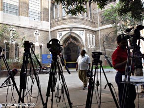 Television crews set up outside Mumbai's Metropolitan Magistrate court where Kasab was charged.