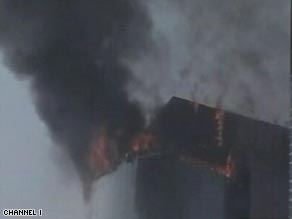 The fire engfuled the top of the Bashundhara City shopping mall in Dhaka.