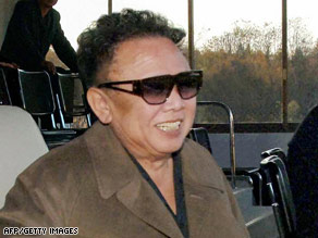 An undated photo of North Korean leader Kim Jong Il relaxing at a football match.