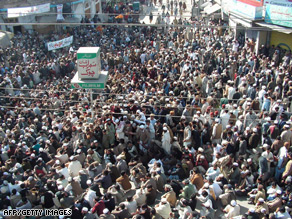 Supporters of cleric Sufi Mohammad gather as they march during a peace rally in the Swat Valley.