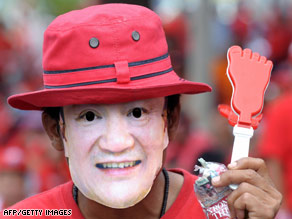 Supporters of Thailand's ousted premier Thaksin Shinawatra rally in Bangkok on Wednesday.