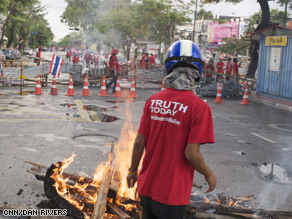 Violent protests have left two people dead and dozens injured in Thailand.