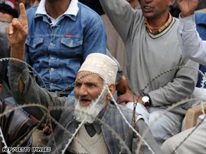 A man gestures during an election rally in Srinagar. Turnout in Indian-administered Kashmire was 24 percent.