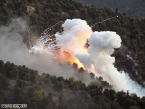 U.S. mortars using white phosphorous target Taliban in Afghanistan's Korengal Valley, October 28, 2008.