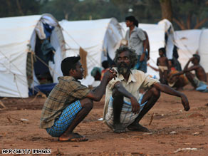 Displaced Tamil civilians at Manic farm in the northern Sri Lankan district of Vavuniya on May 7, 2009