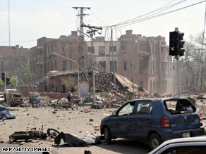 The scene of an apparent suicide car bomb attack on a police building in Lahore on May 27.