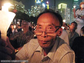 Security officers used umbrellas to disrupt CNN's John Vause working near Tiananmen Square.