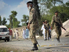 Government troops patrol in northwestern Pakistan on Friday.