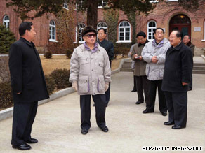 North Korean leader Kim Jong Il, center, as seen at Wonsan University of Agriculture in an undated photo