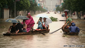 Flooding in China kills 16, forces thousands from homes