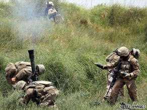 U.S. Marines fire a mortar Wednesday in Afghanistan's Helmand province, where they're fighting the Taliban.