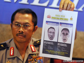 Indonesian police spokesman Nanan Sukarna shows a sketch of the suicide bombers in Jakarta on Wednesday.