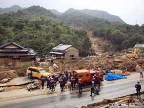 Rescue workers remove debris to search for survivors in Hofu city, Yamaguchi prefecture, on Wednesday.