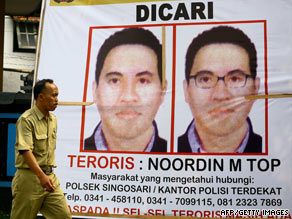 A poster in Malang, East Java, Indonesia, has under "dicari," or"wanted," Noordin Top.